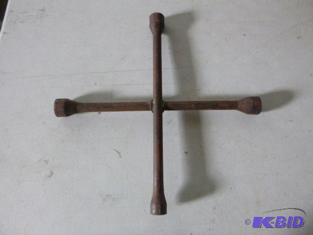 lot 101 image: 4-Way Tire Wrench...