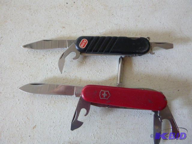 lot 169 image: Two Multi Tool Pocket Knives One is a Buck Bu...