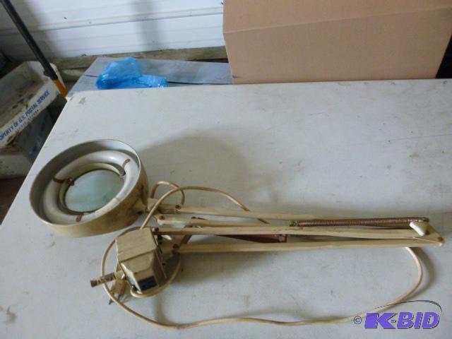 lot 228 image: Light with Magnifying Glass Tested and works....