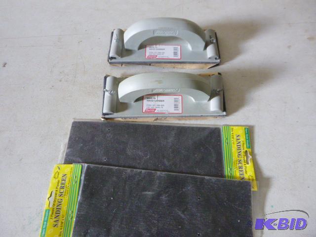 lot 267 image: Two Hand Sanders With two packs of sanding sc...