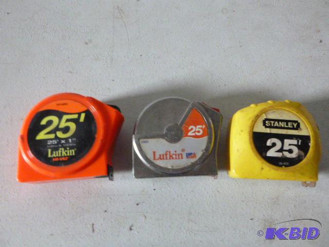 lot 41 image: Three 25 Tape Measures...