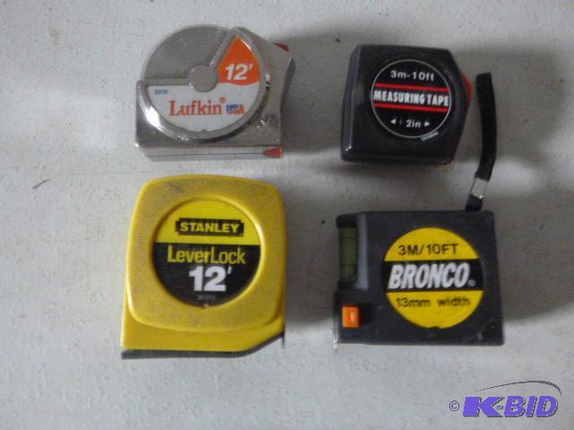 lot 45 image: 4 Tape Measures Two 12 and two 10...