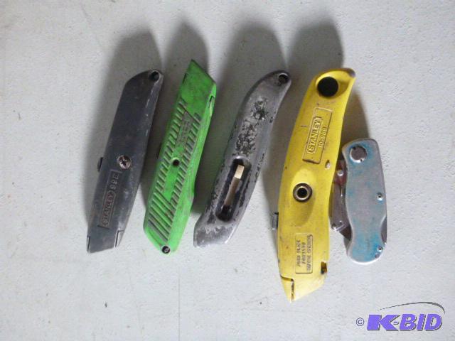 lot 76 image: Five Utility Knives...