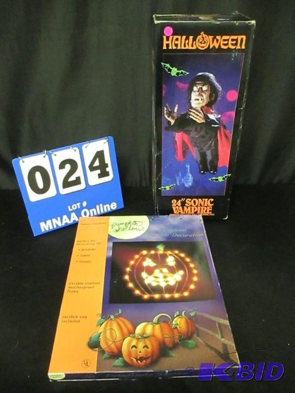 Vampire figure and pumpkin light