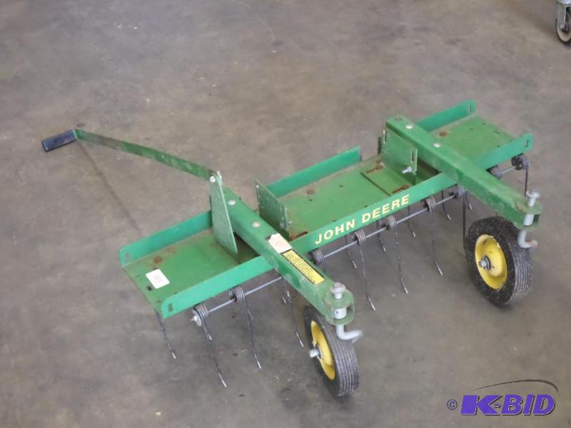 lot 101 image: John Deere Front-Mount Thatch Rake...