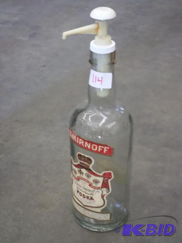 lot 114 image: Smirnoff 1-Gallon Glass Bottle With Dispenser...