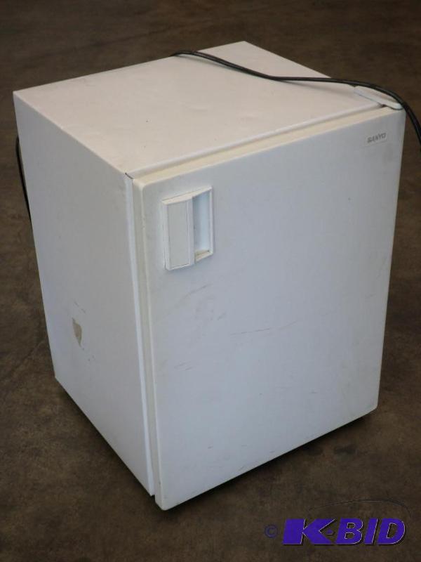 lot 15 image: Sanyo 120Volt Mini Refrigerator With Freezer...
