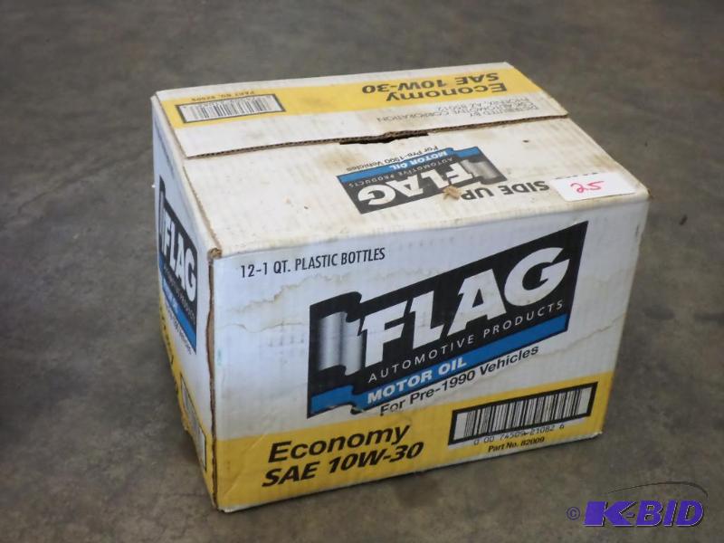 lot 25 image: (12) Quarts Flag 10W-30 Motor Oil...