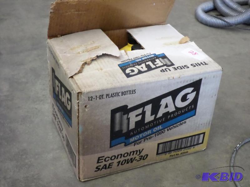 lot 28 image: (11) Quarts Flag 10W-30 Motor Oil...