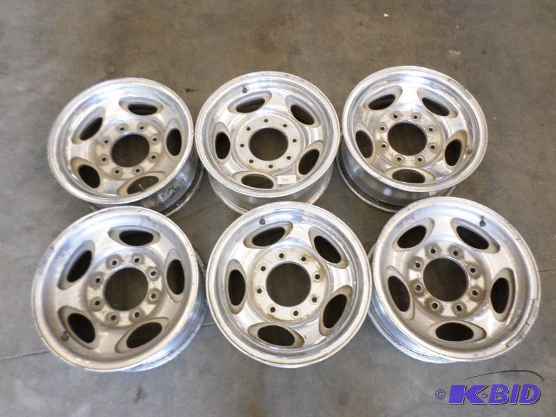lot 94 image: (6) 8-Lug Aluminum 2003 Ford Rims...