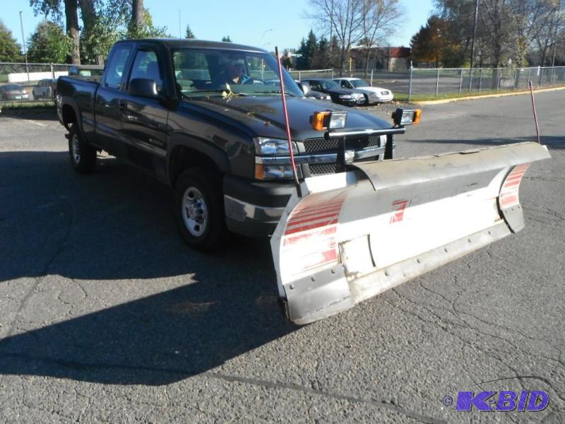2004 Chevy K2500 Four Door Extended Cab Pickup With Plow