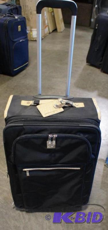 lot 12 image: New Anne Klein Luggage Bag. Black with tan st...