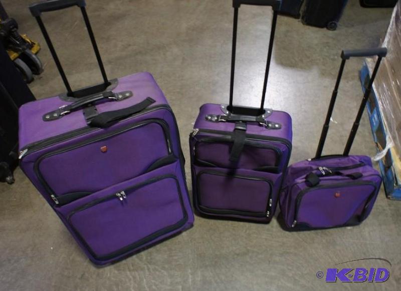 lot 3 image: New Three Piece Luggage Set. Purple in color....