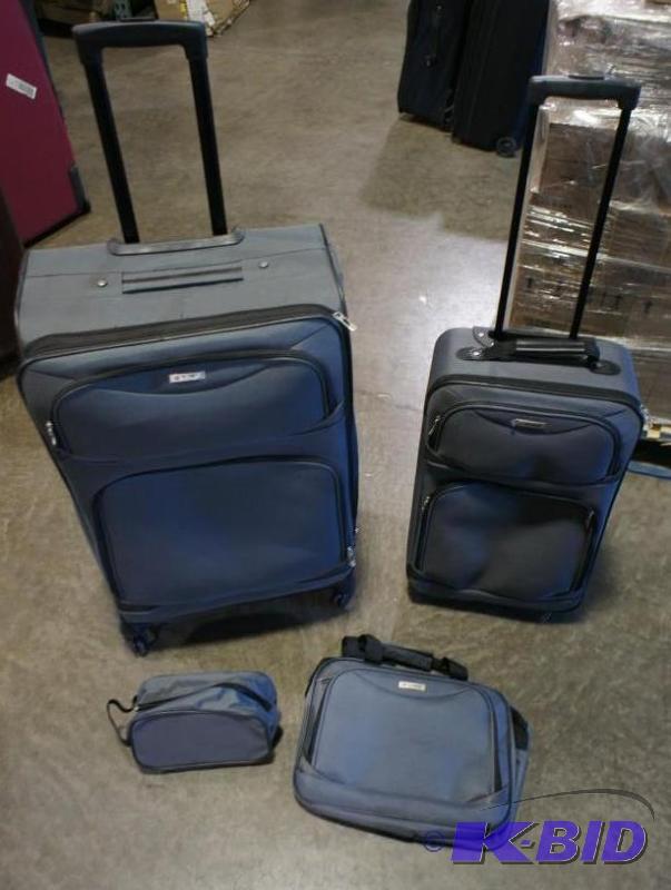 lot 8 image: Tag 4pc luggage set. Gray in color. Dimension...