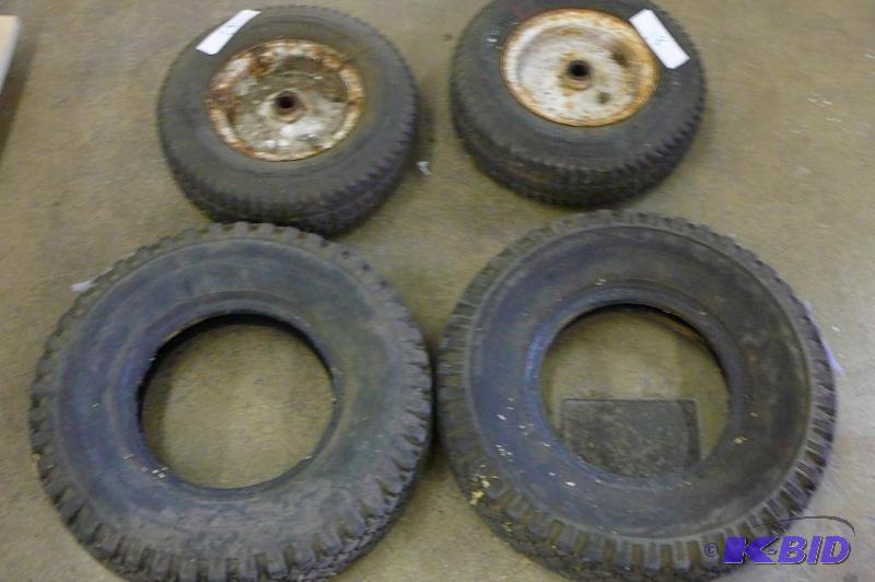 lot 18 image: Tires 2 - 480400-8 2 tires and rims...