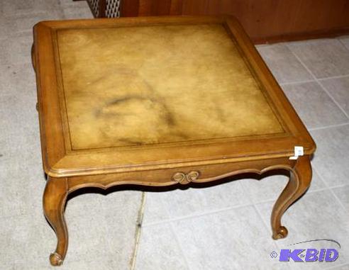 lot 105 image: Vintage Leather top end table- not sure if it...