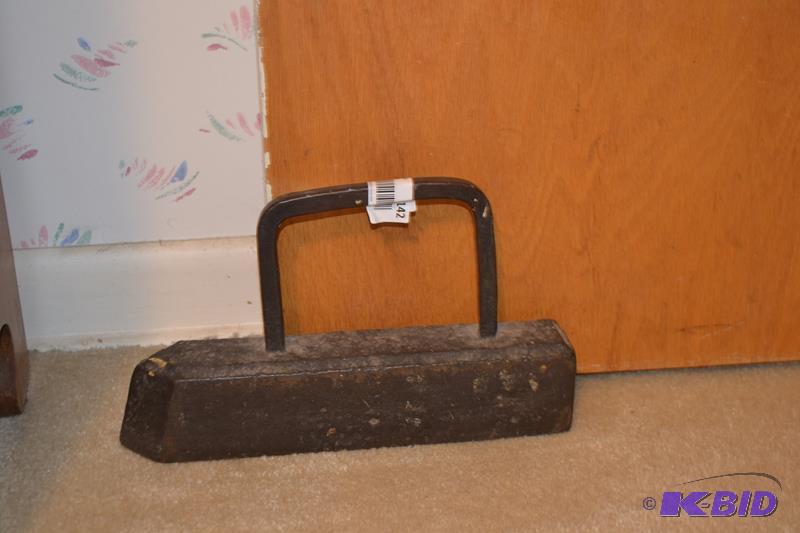 lot 142 image: Iron door stop 11x7"...