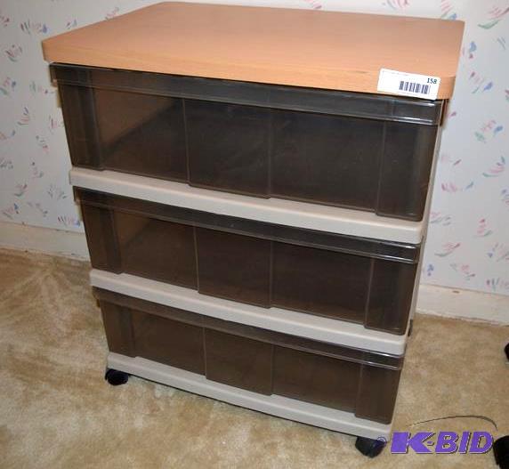 lot 158 image: Plastic Rolling storage cabinet with laminate...