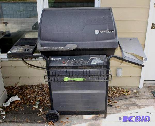 lot 28 image: Kenmore Gas Grill with propane tank- as seen ...