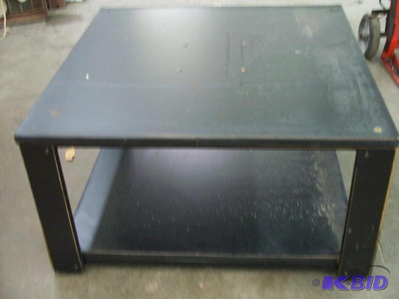 lot 57 image: Black coffee table...