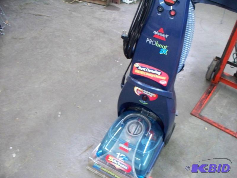 lot 59 image: Carpet cleaner plugged in and turned on...