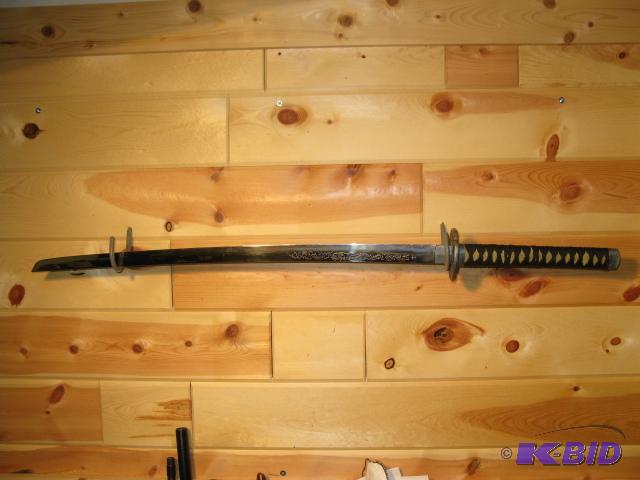 Samurai sword with sheath, 28 inch with etchi...