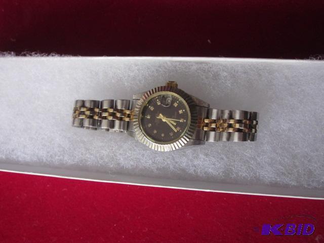 Womens gold and silver with diamonds Rolex w...