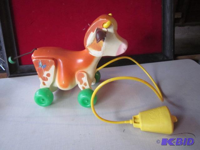 1972 Fisher Price cow pull toy, still will &q...