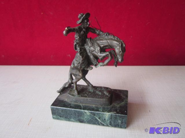 Highly collectible copper statue on marble ba...