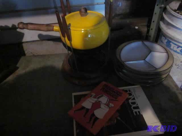 Yellow enamel Fondue pot with plates and book...