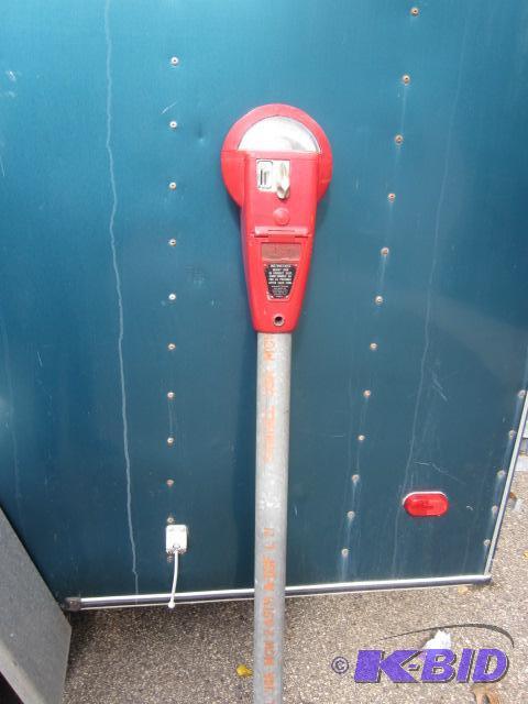 Red parking meter with heavy post, full size ...
