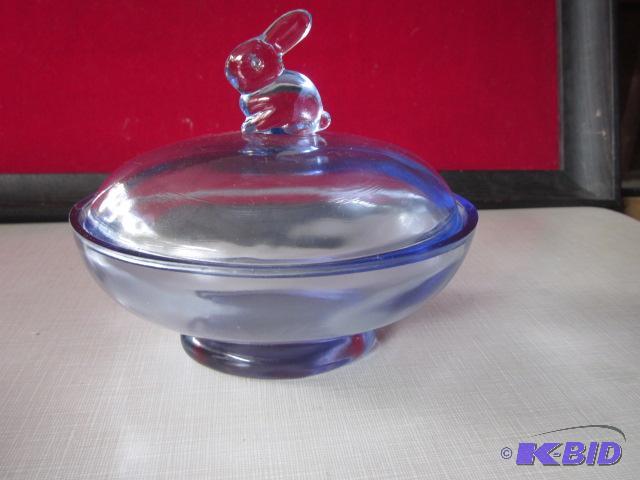 Bluelavender colored glass rabbit covered ca...