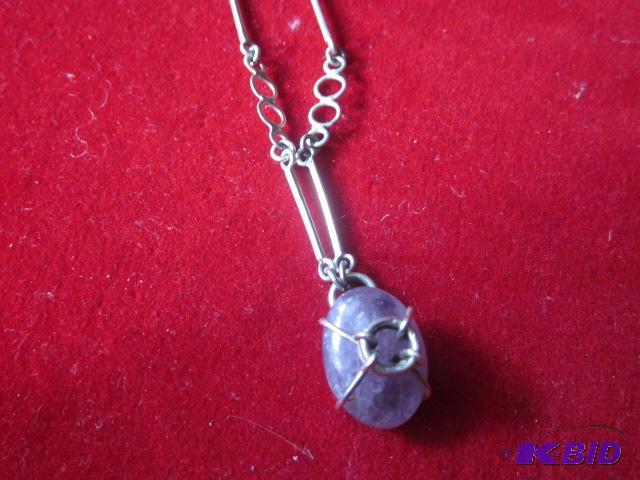 Sterling Silver necklace with purple stone pe...