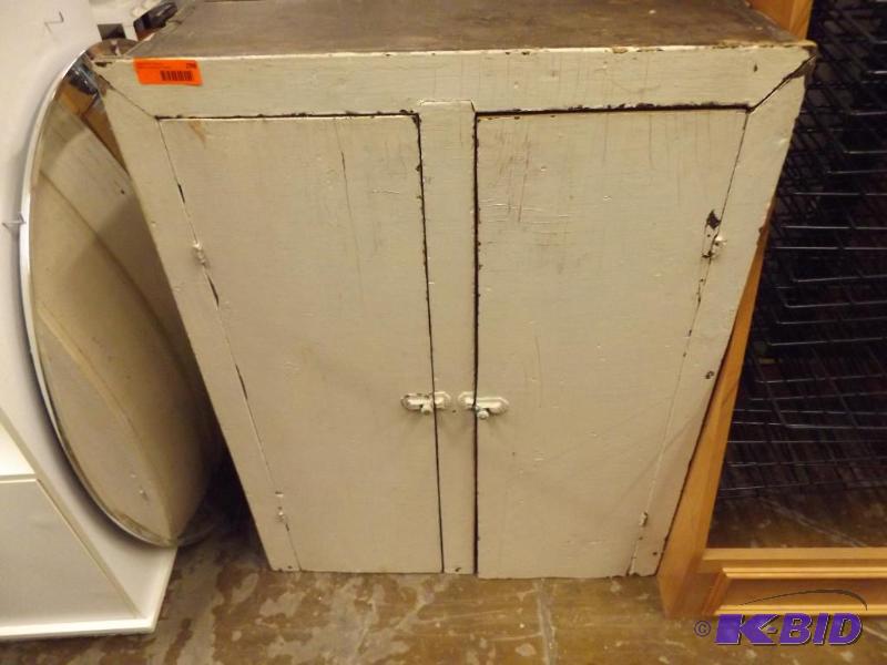 Old storage cabinet 29 wide x 39 tall x 1...