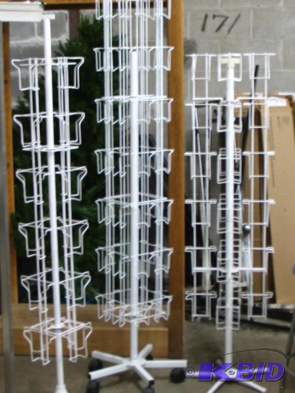 Three Display Racks, rotating, one on wheels...