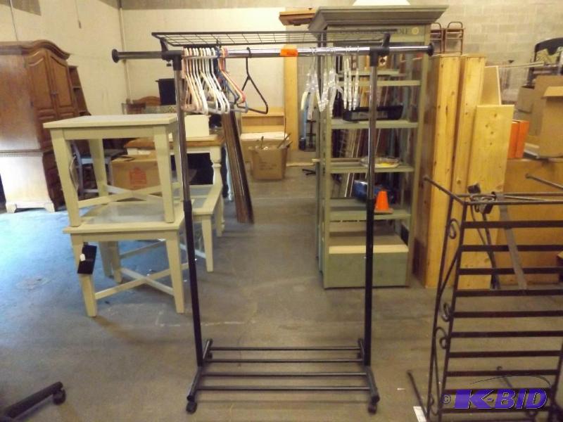 Coat Rack on wheels, 4 rod, approx 62 tall...