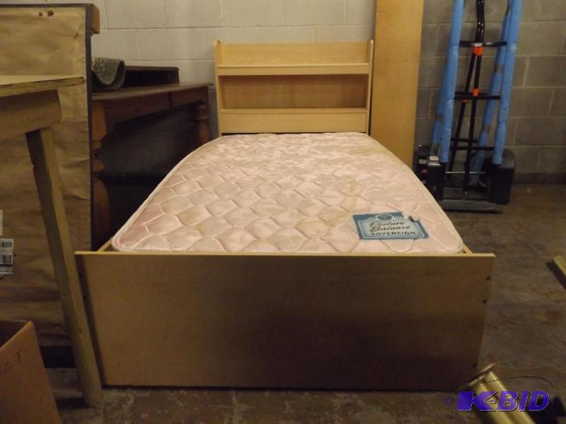 Twin size bed, missing one of the drawers und...
