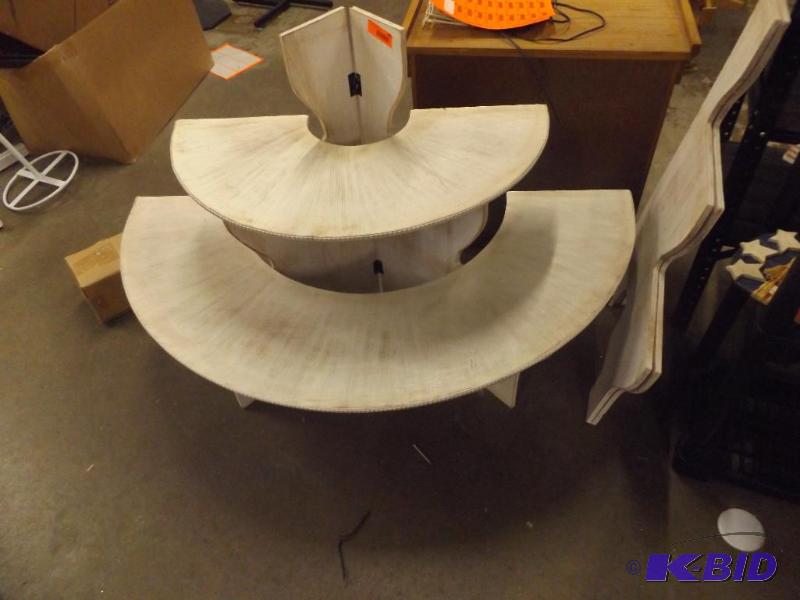 Half round display table, wood. There is also...