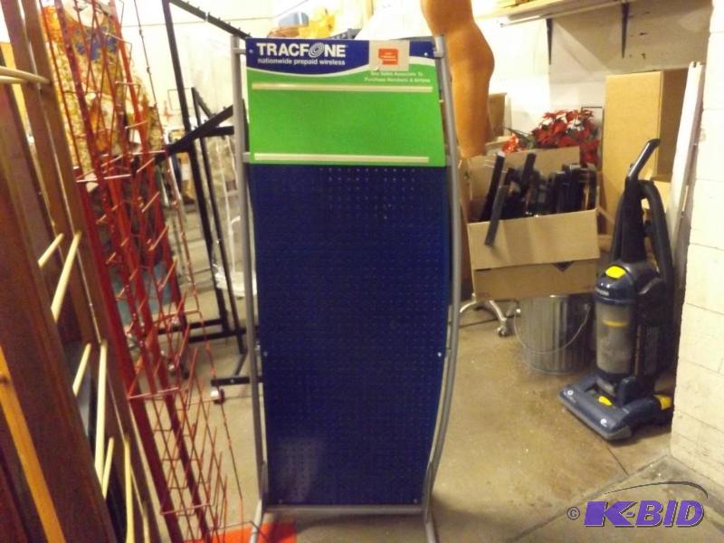 Tracfone peg board display stand, missing two...