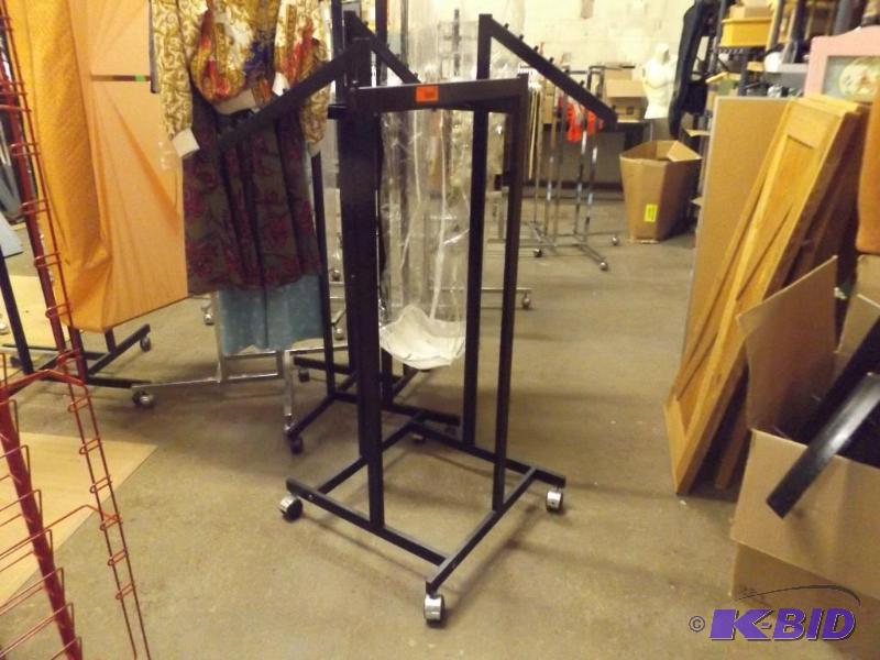 Black metal clothing display rack, on wheels...