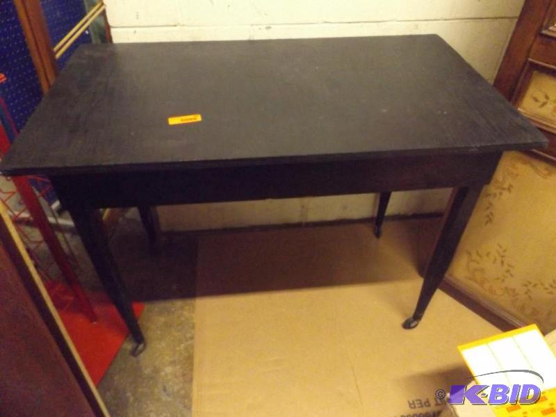 Table, wooden, on wheels. 3 tall x 42 x 24...