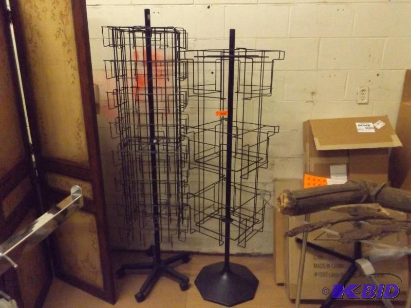 Two black display racks, 5 foot and 6 foot ta...