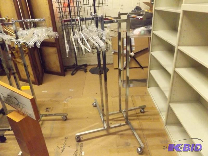 48 tall, metal clothing rack, on wheels. ha...