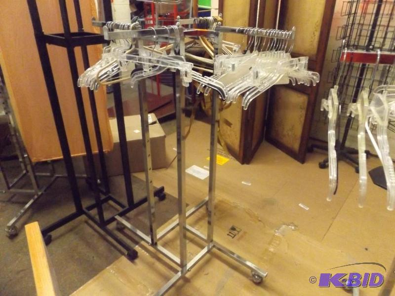 Metal displayClothing rack. 48 tall, on wh...