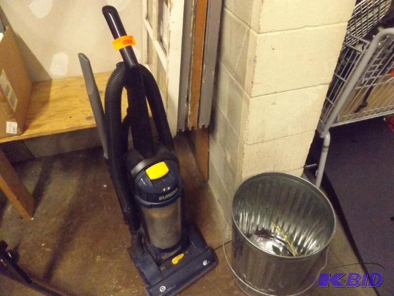 metal trash can and Eureka Vacuum...