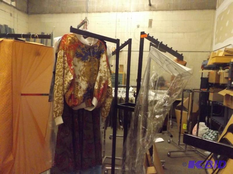 7 foot tall, metal displayclothing rack, on ...