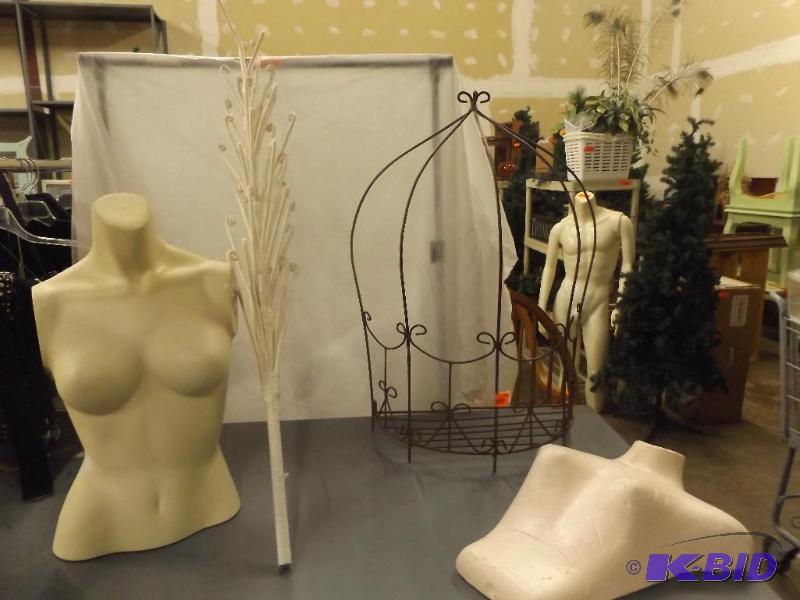 Two mannequin busts and wall shelf...