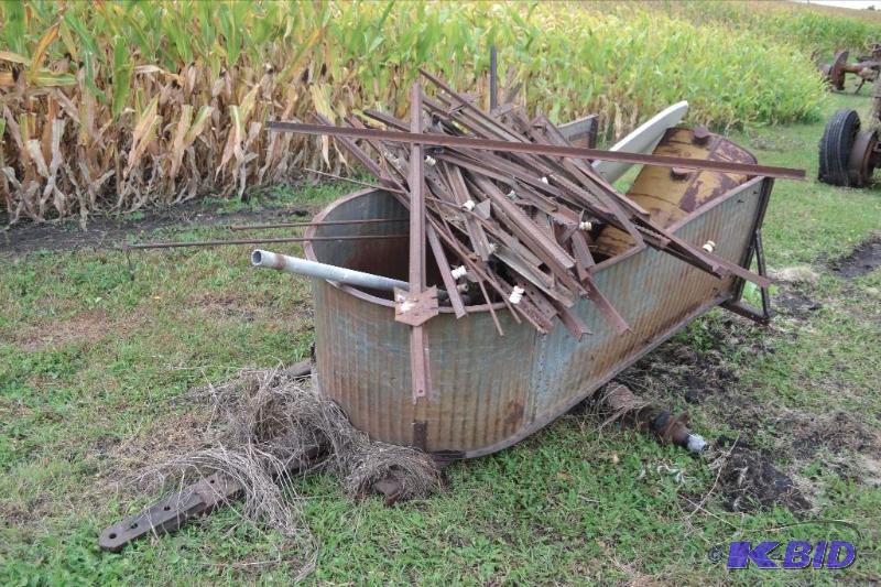 lot 79 image: Small trailer with fence posts ...