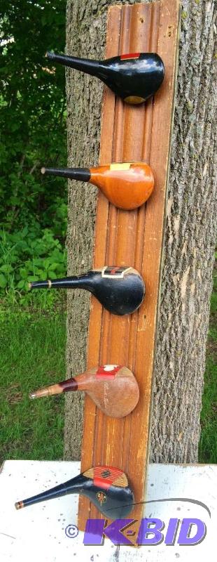Antique golf club head coat rack