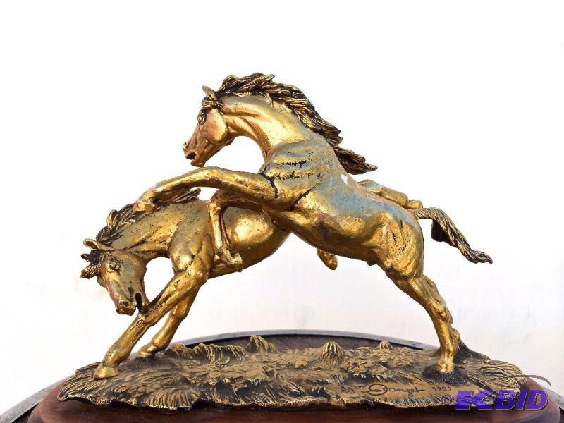 lot 2 image: The Challenge In pewter with a 24K gold gilt vermeil